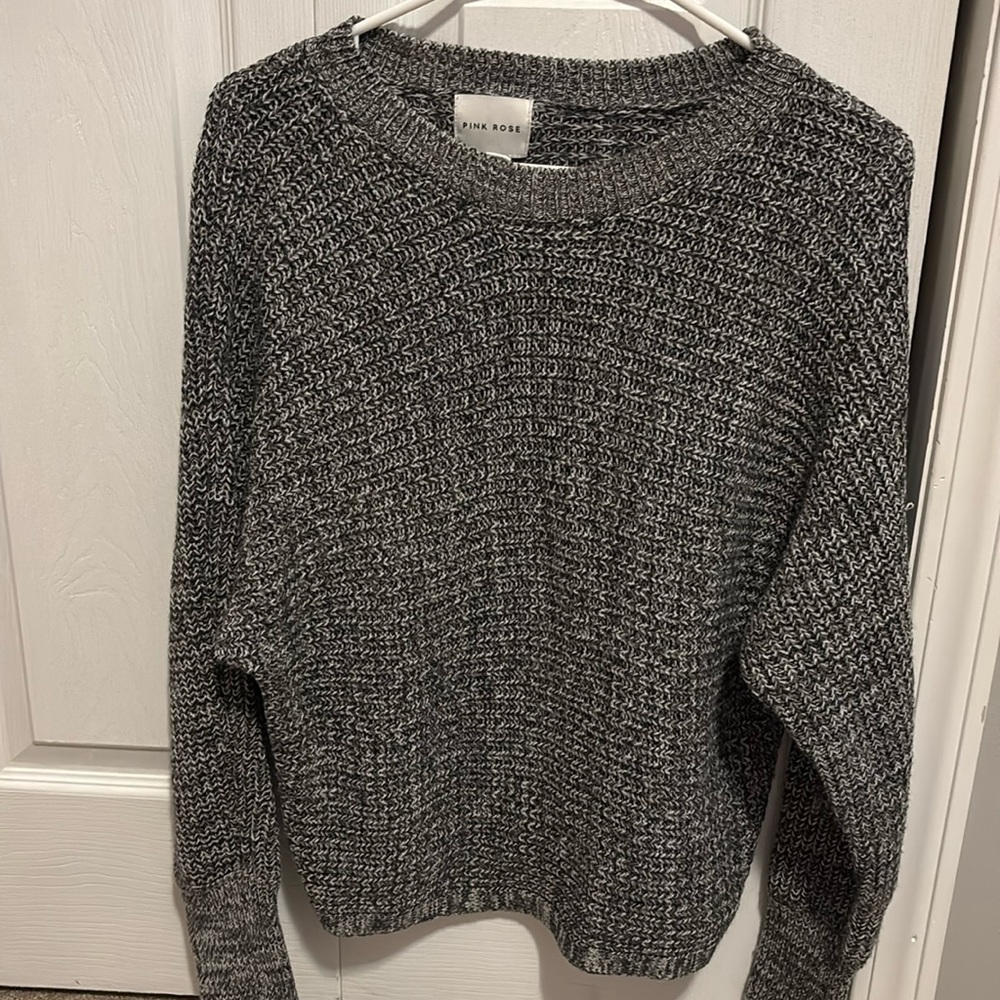 Small grey knitted sweater